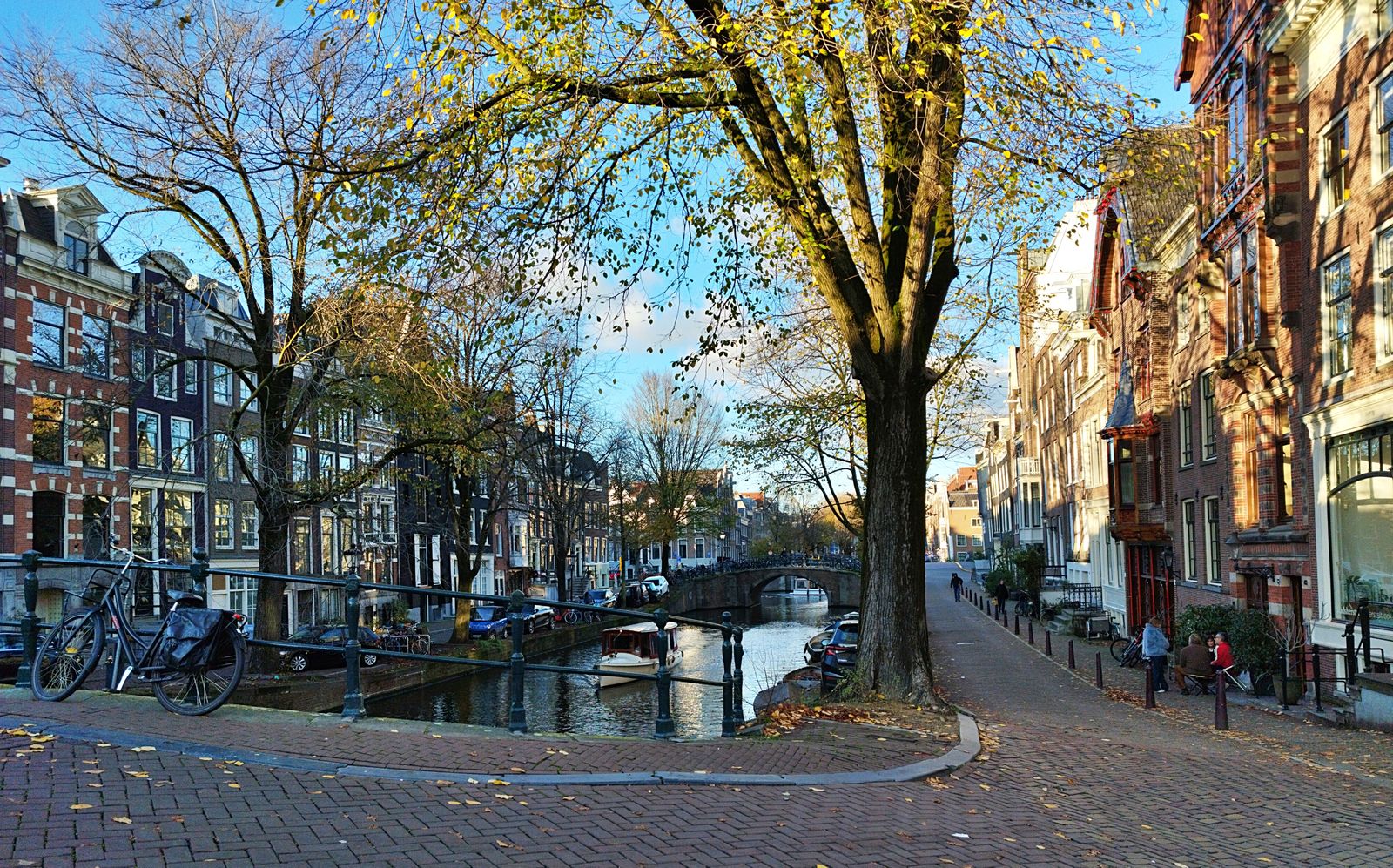 Cozy Amsterdam street in the Jordaan neighborhood with autumn leaves